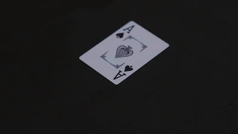Ace pocker card falling on the black table Video stock 77041875