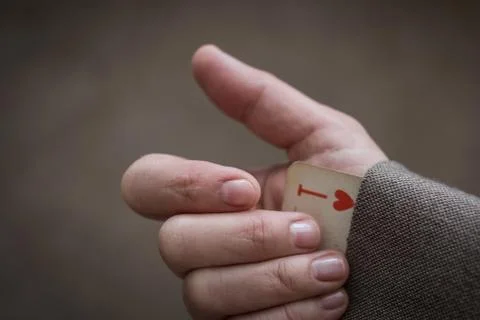 Ace up the sleeve. Stock Photos