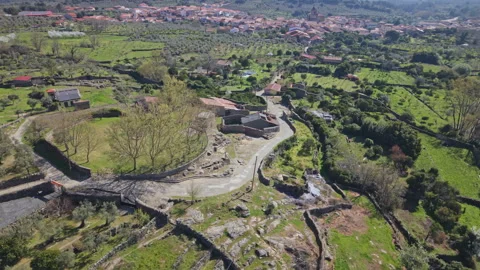 Acebo Fast Orbit Over Ruins, Farmland and Old Cross Monument Stock Footage 336557018