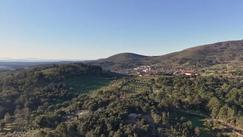 Acebo Village Drone Pullback Over Olive Groves and Spanish Farmland Stock Footage 335377560