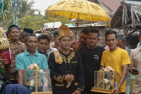 Aceh tradition of escorting the groom to the bride's house Stock Photos