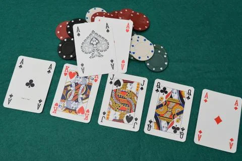 Aces pair on a gambling table with chips Photos