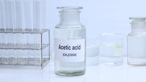 Acetic acid in containers Stock Footage 256877434
