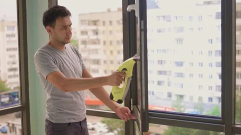 Achieve Efficient Window Cleaning Results with Innovative Squeegee Technology Stock-Footage 311730847