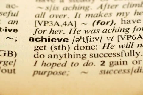 Achieve word in dictionary Stock Photos