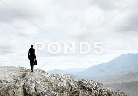 Achieving top of success Stock Photos