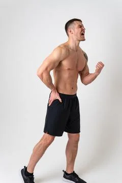 Aching hip in a man white background strong pain body muscle, backache white Stock Photos