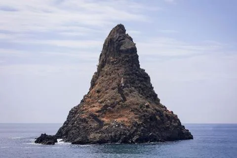 Acitrezza rocks of the Cyclops, sea stack Faraglione Grande in Catania, Sicily Stock Photos