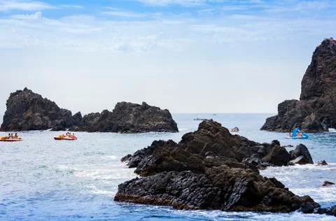 Acitrezza rocks of the Cyclops, sea stacks in Catania, Sicily, Italy Stock Photos