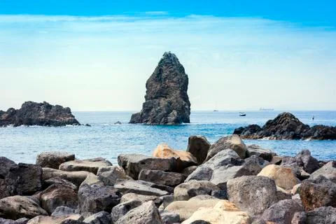 Acitrezza rocks of the Cyclops, sea stacks in Catania, Sicily, Italy Stock Photos