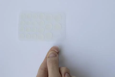 Acne pimple patch to get rid of zits Stock Photos