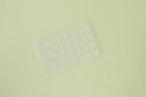 Acne pimple patch to get rid of zits . New set with green background Stock Photos