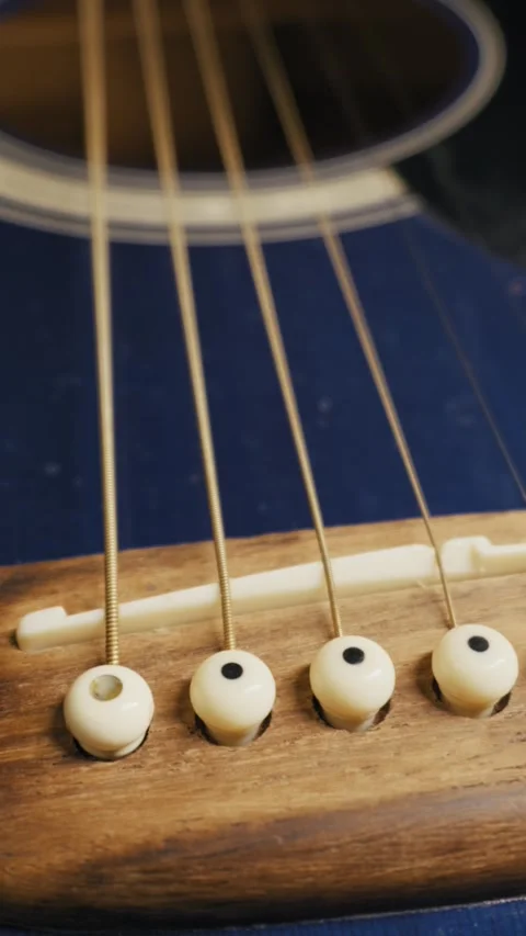 Acoustic Guitar Bridge and Strings in Macro Detail Stock Footage 325782670