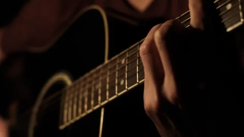 Acoustic Guitar Close-Up String Plucking at Night Stock Footage 303754986