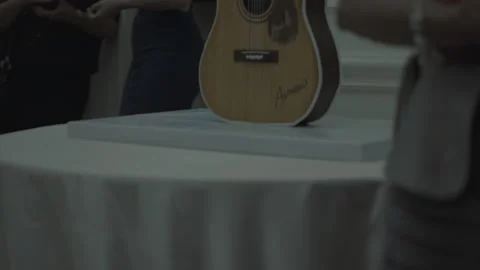 Acoustic Guitar Displayed on Table at Elegant Event 스톡 동영상 217478447