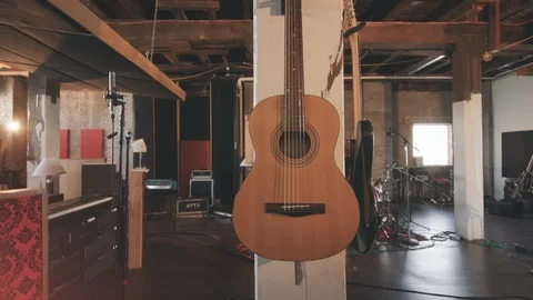 Acoustic Guitar Mounted in Studio Move In Stock Footage 89540935