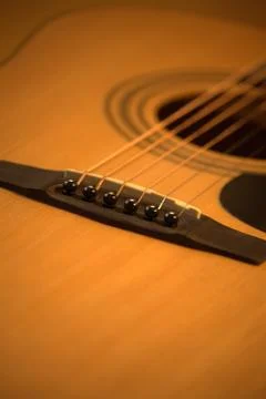 Acoustic guitar photo in cozy, warm tones Stock Photos