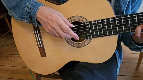 Acoustic Guitar Player Practicing Classical positions At Home Stock Footage 344059674