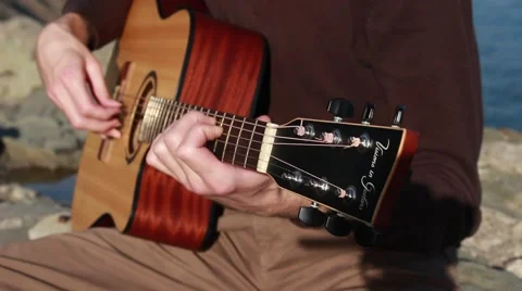 Acoustic guitar playing 스톡 동영상 61694712