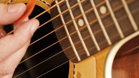 Acoustic Guitar Soundhole and Frets closeup Stock Footage