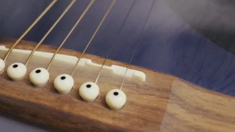 Acoustic Guitar Strings and Bridge in Ethereal White Smoke Stock Footage 325782681