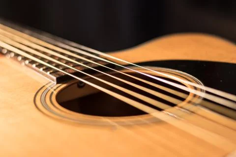 An acoustic guitar strings Stock Photos
