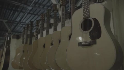 Acoustic Guitars On Racks Stock Footage 275536920