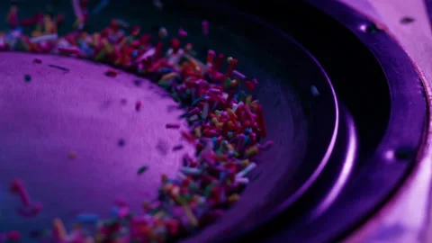Acoustic sound system close-up, flying confetti sweets. Loud music volume macro Stock Footage 169117325