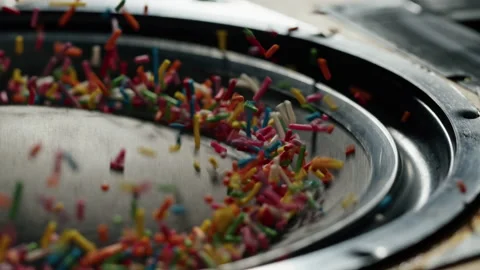 Acoustic sound system close-up, flying confetti sweets. Loud music volume macro Stock Footage 169199338