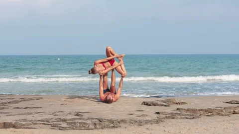 Acro Yoga at the beach Stock Footage 115534033