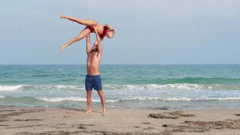 Acro Yoga at the beach Stock Footage 115534403