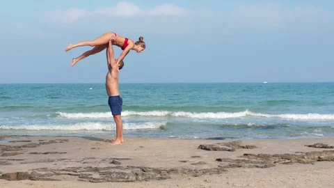 Acro Yoga at the beach Stock Footage 115536951