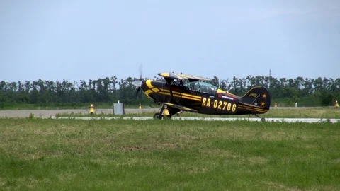 Acrobaster PS-2B with number RA 0270G taxiing to runway. Stock Footage 121203841