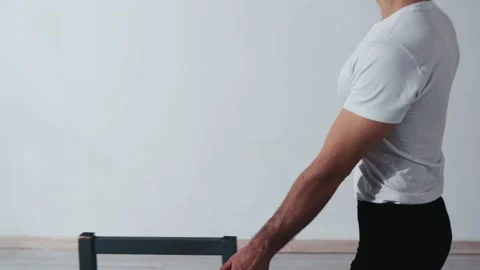 The acrobat keeps balance on the chairs. Acrobatic number without insurance Video stock 151646428