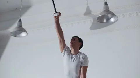 The acrobat keeps balance on the chairs. Acrobatic number without insurance Video stock 151648058