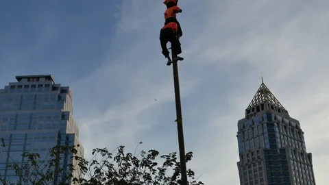 Acrobat performance in park Stock Footage 104657970