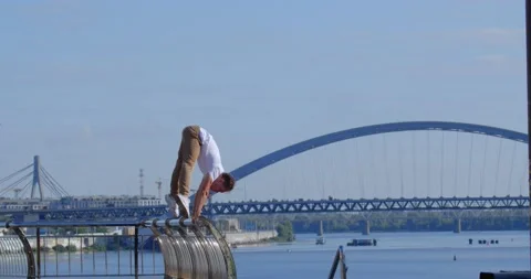 Acrobat performing  tricks Stock-Footage 159787780