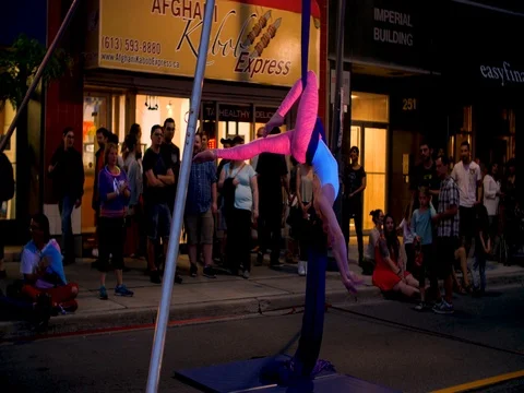 Acrobat performs at Ottawa 2017 Glowfair. Stock Footage 76769142