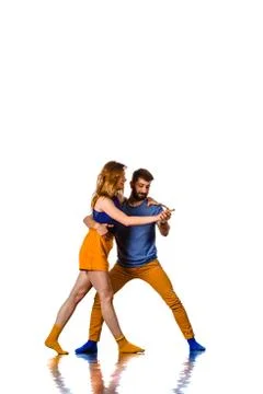 Acrobat pose of a two talented, young dancers Stock Photos