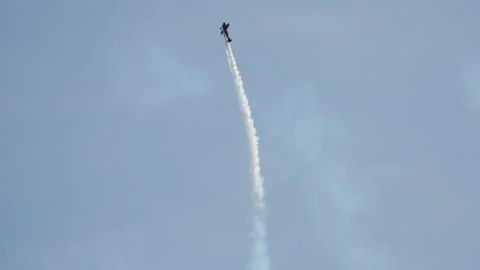 Acrobatic airplane flying vertically up Stock Footage 314337499