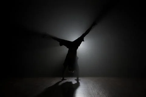 Acrobatic Artistic Dance Backlit Stock Photos