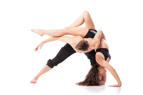 Acrobatic dancing pair doing hard pose Foto stock