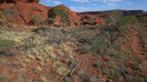 Acrobatic Drone flight over the  Kings Canyon in Australia , AU Stock Footage 262928185