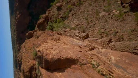 Acrobatic Drone flight over the  Kings Canyon in Australia , AU Stock Footage 262929692