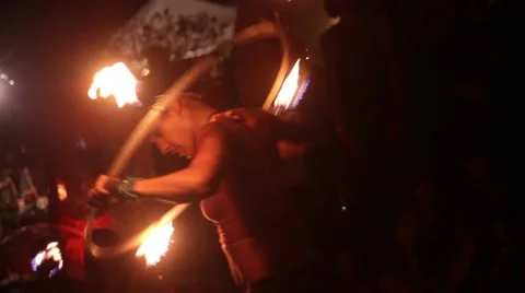 Acrobatic female fire dancer Stock Footage 43144275