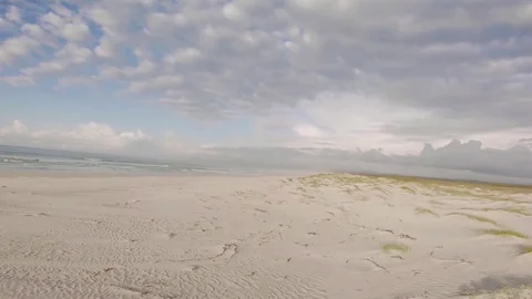 Acrobatic Flyover of Coastal Beach Stock Footage 114824248