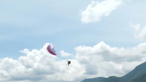 Acrobatic paragliding synchro white red 27 (slow motion) Stock Footage 40281111