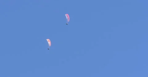 Acrobatic paragliding synchro white red 31 (4K) Stock Footage 40291049