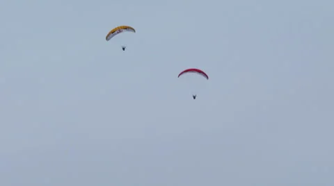 Acrobatic paragliding synchro yellow red 22 Stock Footage 40299649