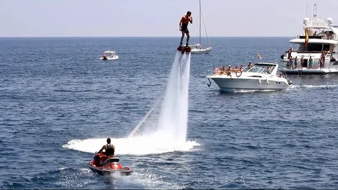 Acrobatics with flyboard. Stock Footage 106501652